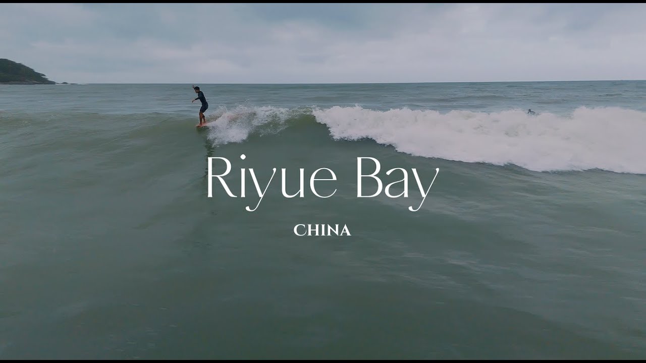 Surfing Riyue Bay, Hainan Island, China