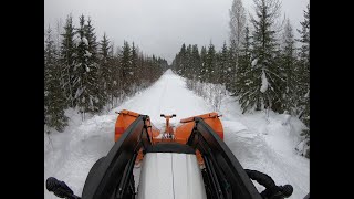 FMG IVALO snow plough opening forest road in deep snow