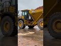 Rainy day fun #construction #komatsu #takeuchi #bell  #haultrucks #skidloader #shortsfeed #viral
