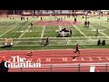 Dog breaks loose to wins relay race in US high school track event