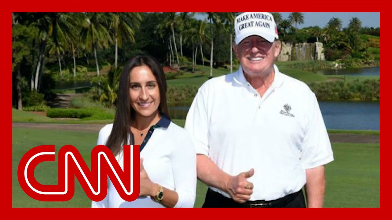 Reporters investigate the identity of the woman who posed with Trump