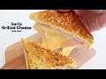 GARLIC BREAD GRILLED CHEESE WITH HAM