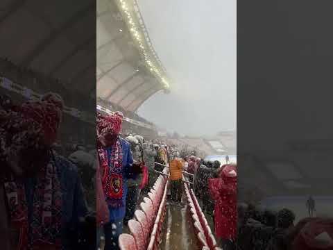 Chanting soccer fans unbothered by snow #Shorts