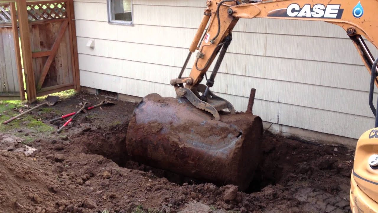 Environmental Works removing a heating oil tank after cleaning and