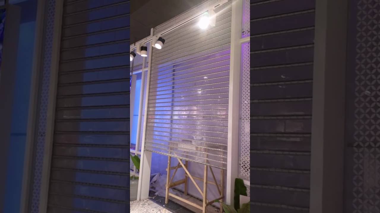 Automatic poly-carbonate rolling shutter