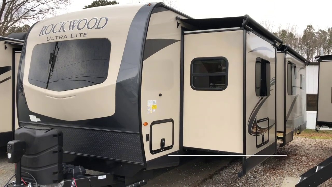 ultra lite travel trailers with king bed