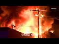 Large fire destroys an Auto Collision Center in Montebello California.