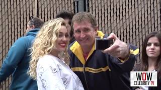 Miley Cyrus greets fans at Jimmy Kimmel Live in Hollywood