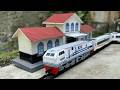 unboxing dan merakit miniatur stasiun kereta api berama kereta api cc 203 wnb gerbong panjang