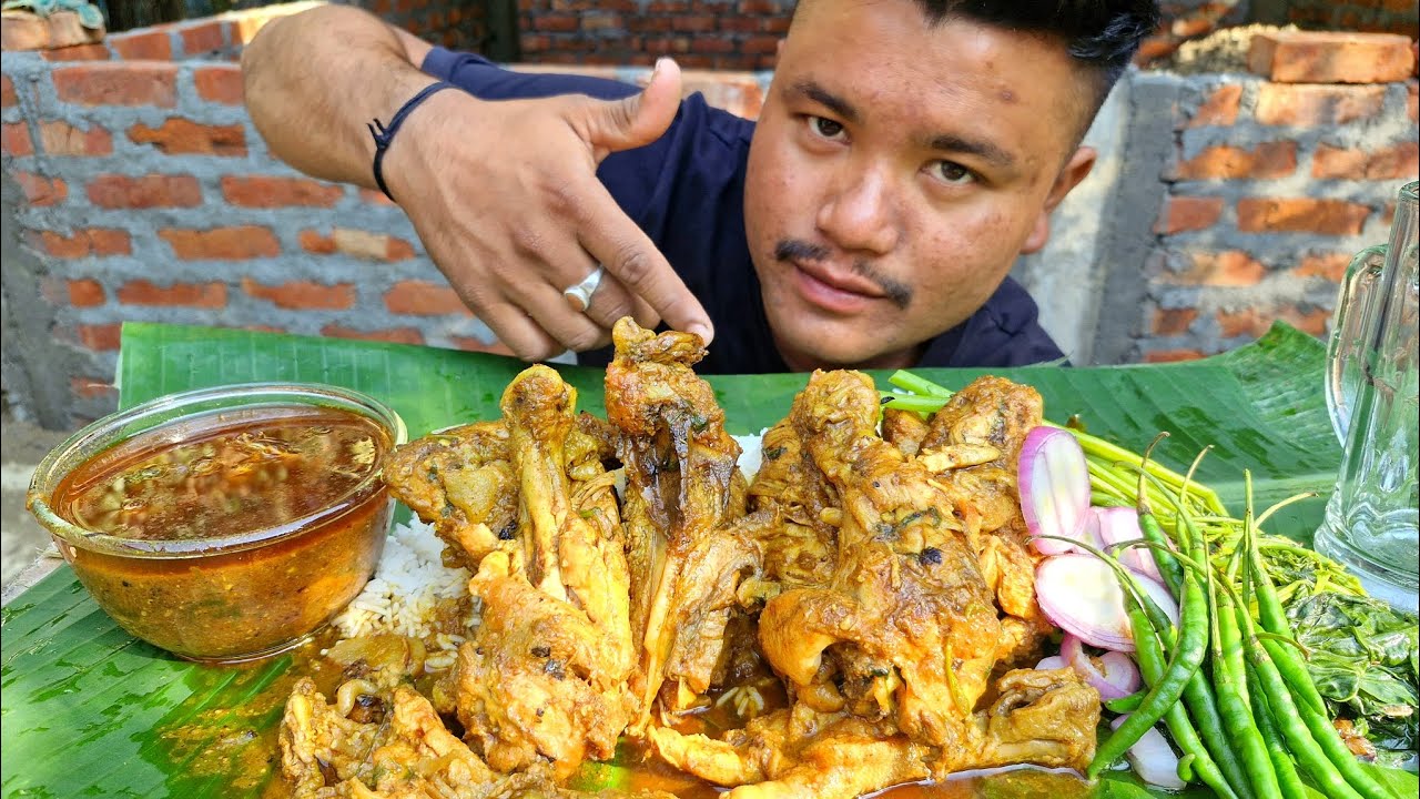 EATING SPICY CHICKEN CURRY WITH BASMATI RICE 