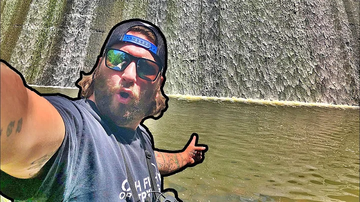 MICRO Fishing a HIDDEN Roadside Spillway! (Giant Bass Tries to Eat my Fish!!)