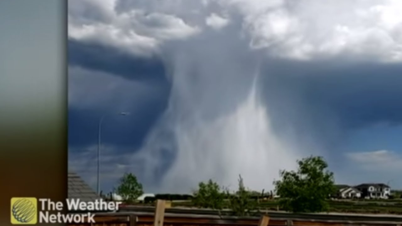 rain man SPECTACULAR hail shaft takes over the Calgary, Alberta sky