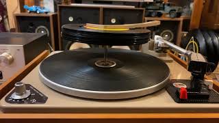 Garrard AT6 auto changer  playing 10x 45  rpm vinyl records.