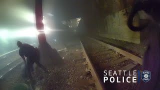 Police Rescue Man from Oncoming Train