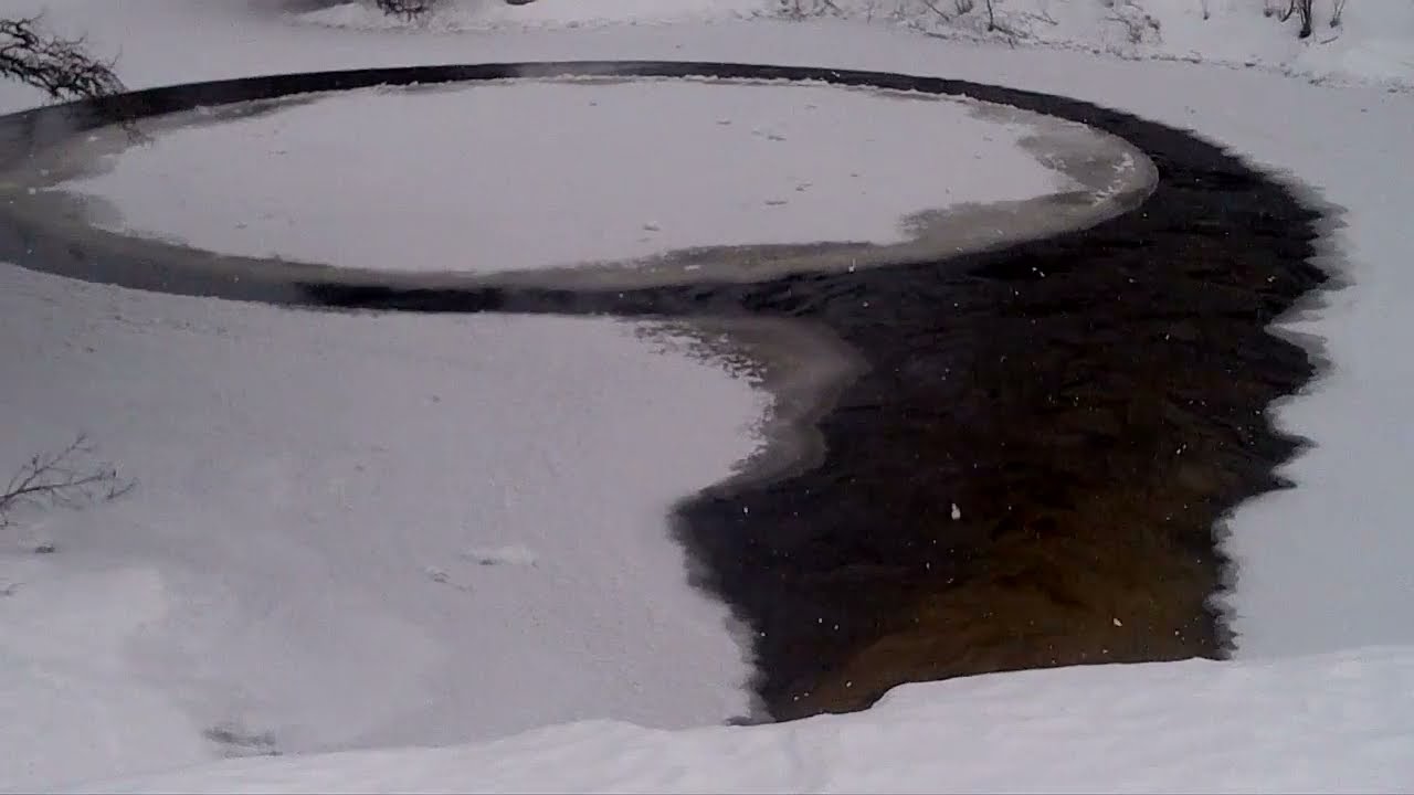 Strange spinning ice circle in river - YouTube