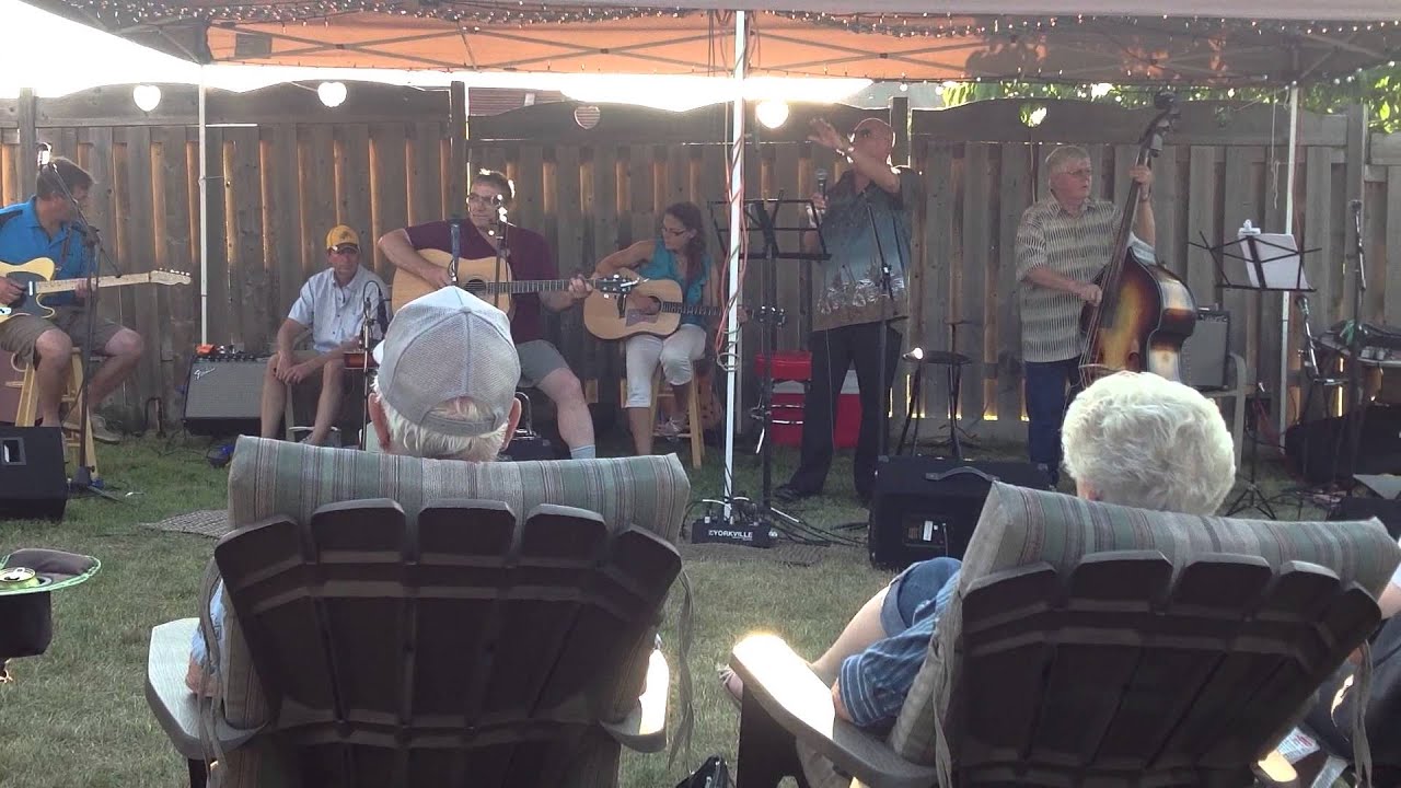 Warren Bell and friends entertain at birthday celebration.