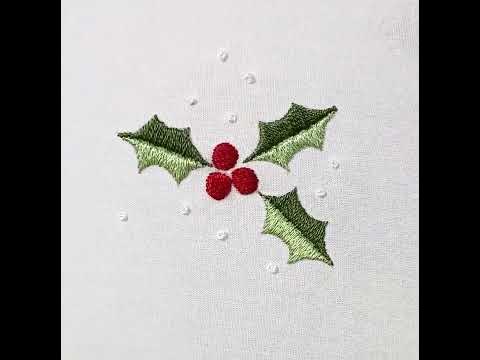 Cross stitch Christmas tree in a holly frame embroidery design