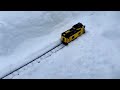 Lego snow plow train working and clearing snow