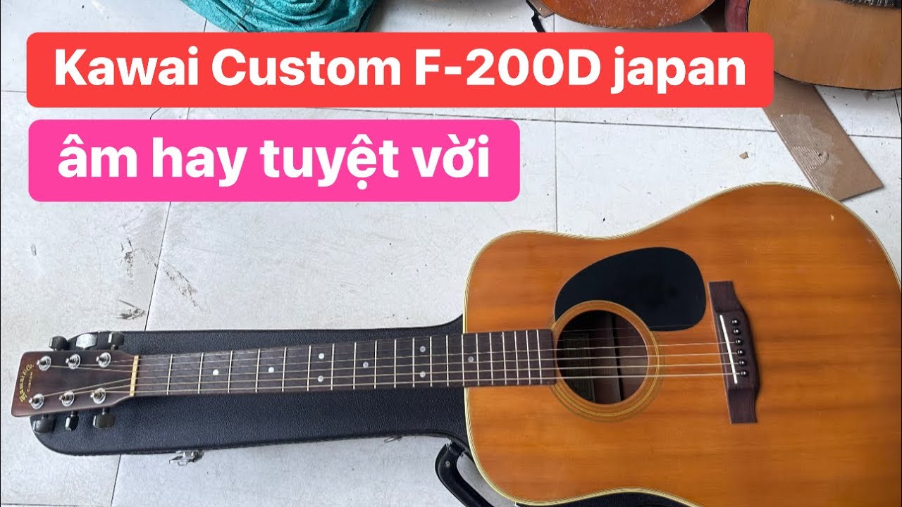 Đàn guitar Kawai Custom F-200D âm rất hay. Giá: 3 triệu. guitar