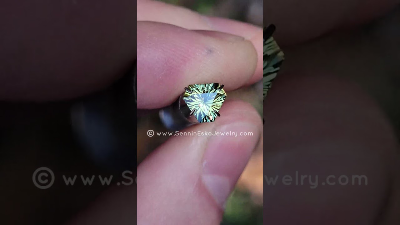 Check out this 1.5ct Yellow/Green Sapphire Triangle 