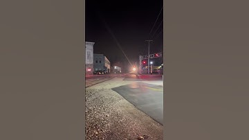 BNSF leads a UP on NS 179 by downtown London, OH