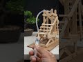 Handmade staircase extends from stick