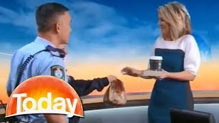 Police officers deliver McDonald's on live tv