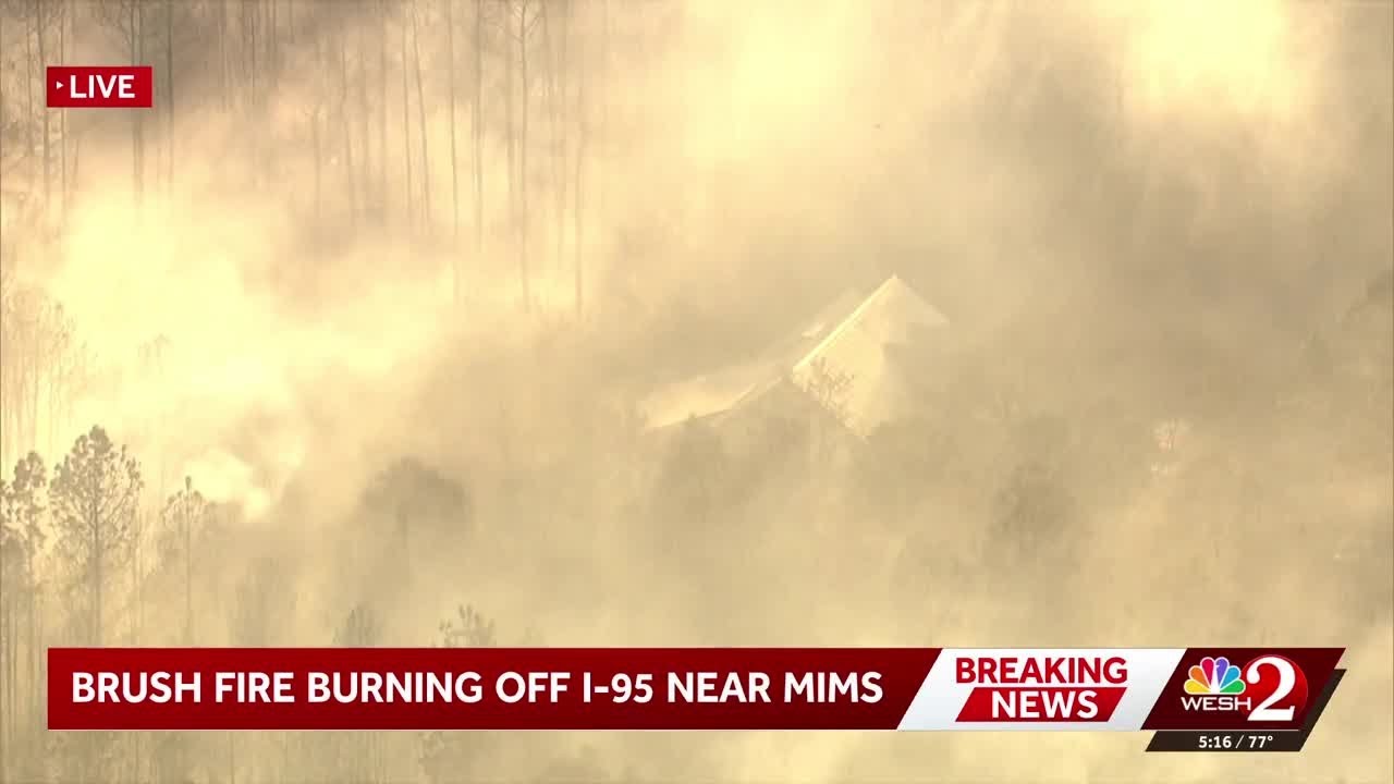 Brush fire burning in Mims near I-95 - YouTube
