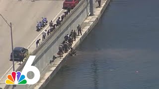 Stolen car suspect jumps into pond to flee officers following police chase in Miami-Dade