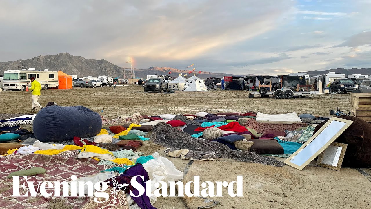 Burning Man revellers begin desert exodus after flooding left thousands stranded