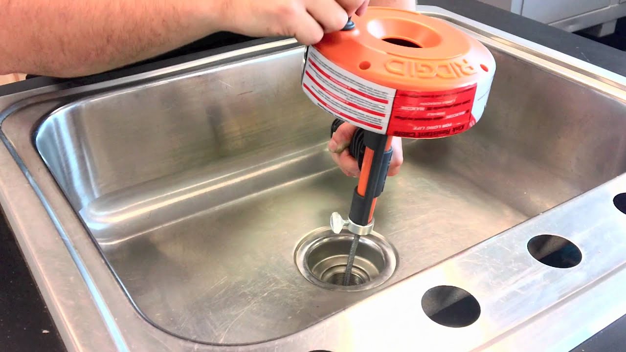 How to Unclog a Bathroom Sink with a Drain Snake - Ridgid Power Spin 