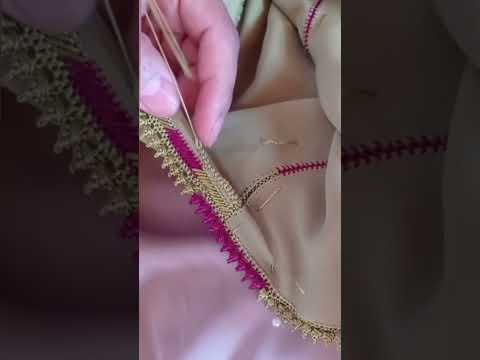 ضرس خفيف على فتحة العنق لجلابة 