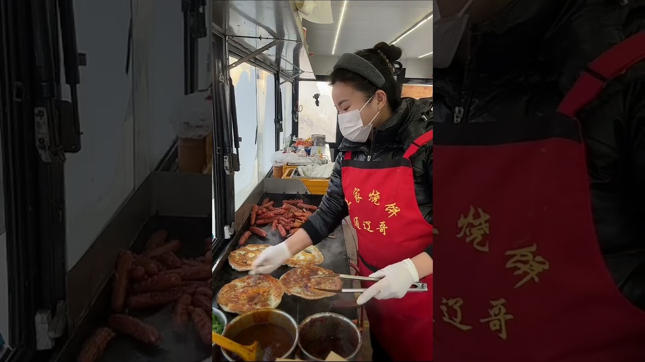 Hardworking lady running food cart and selling meat breads