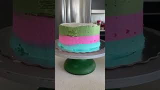 Leftover cupcake frosting to decorate a tri-colored cake.