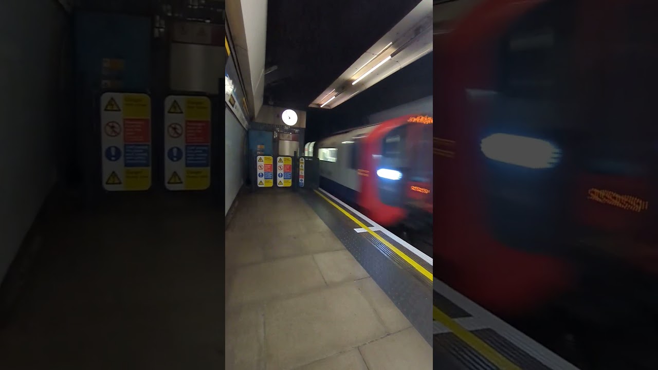 2009 Stock Victoria Line train arriving at Tottenham Hale station 
