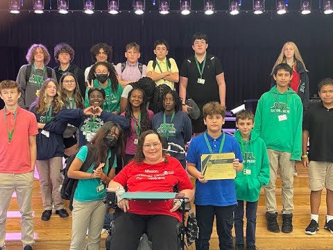 Quadriplegic Presenting East Naples Middle School A Certificate Of Appreciation