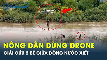 Nghẹt thở khoảnh khắc nông dân dùng drone giải cứu 2 bé mắc kẹt giữa dòng nước xiết | CafeLand