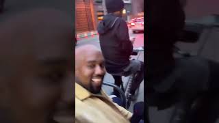 Kanye West riding on a May Bike in San Francisco (2018)