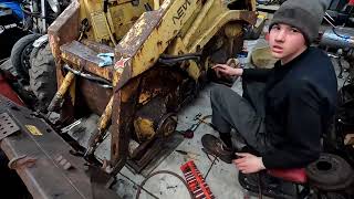 Replacing A Axle Seal On A New Holland Skid Steer