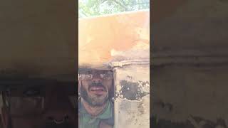 Welding a tight spot via mirror and positioning lanyard