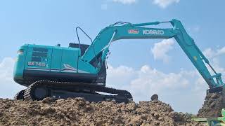 แกะกล่องมาสามปียังเปรี๊ยะ kobelco sk140lc11 เปิดขอบสระงานปากบ่อ excavator and truck