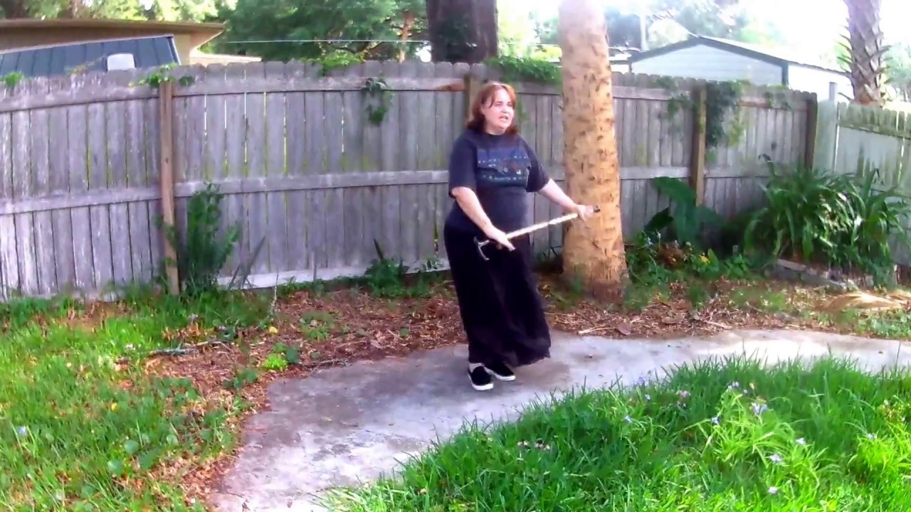 dancing with a cane in backyard with seasparkle