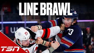 Devils\/Rangers break into full on line brawl right from puck drop