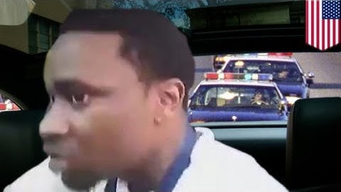 Police body cam video shows crazy suspect drag cop by car door, almost kills him - TomoNews