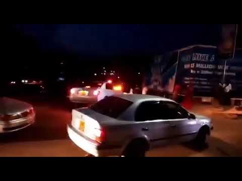 Police impound cars that were moving past curfew