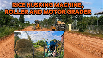 Motor Grader and Roller Grading and Rolling Embankment Meet The Rice Husking Machine along the Road