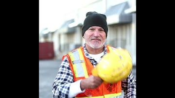Total Work Wear and Safety - Man put on hard hat