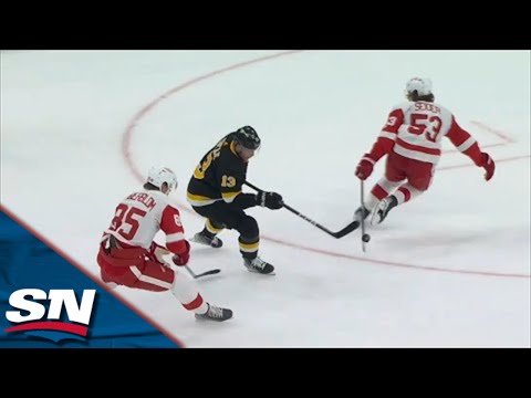 Charlie Coyle Dekes Through Red Wings Defenders Before Sniping Past Ville Husso