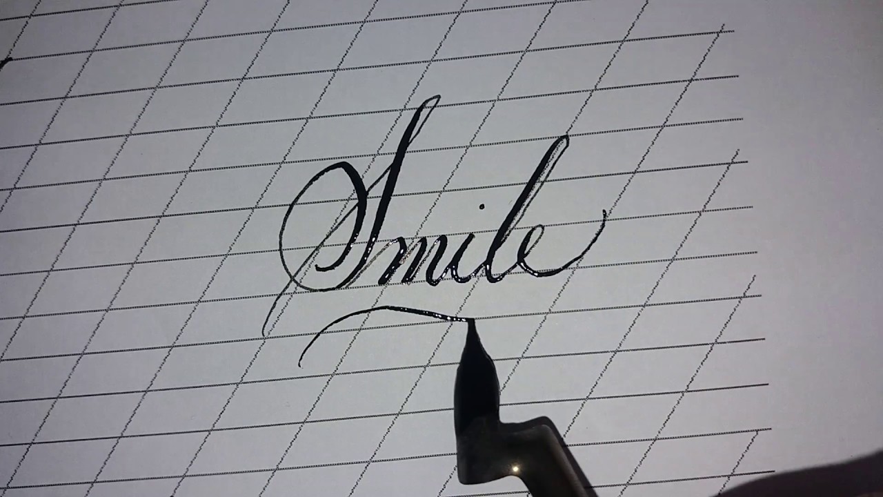 Writing the word Smile in calligraphy - YouTube