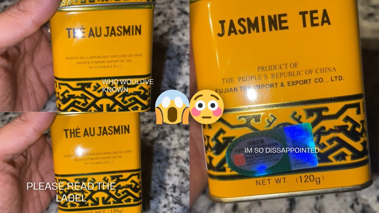 A photo of a person holding a cup of jasmine tea